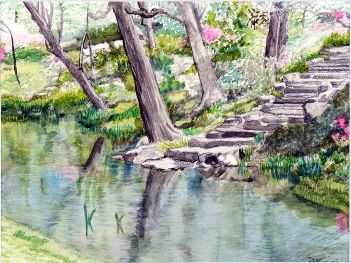 Serene garden pond with stone steps and trees