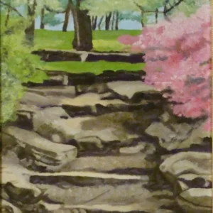 Stone steps in spring garden with pink blooms