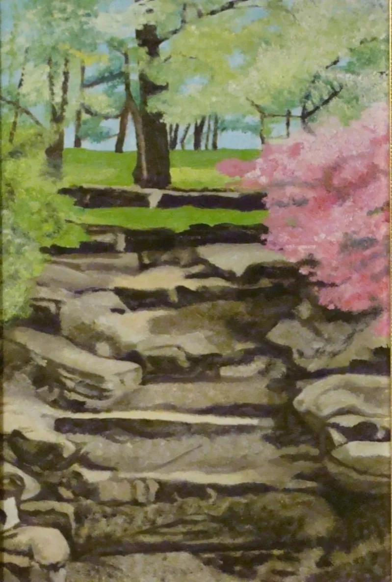 Stone steps in spring garden with pink blooms